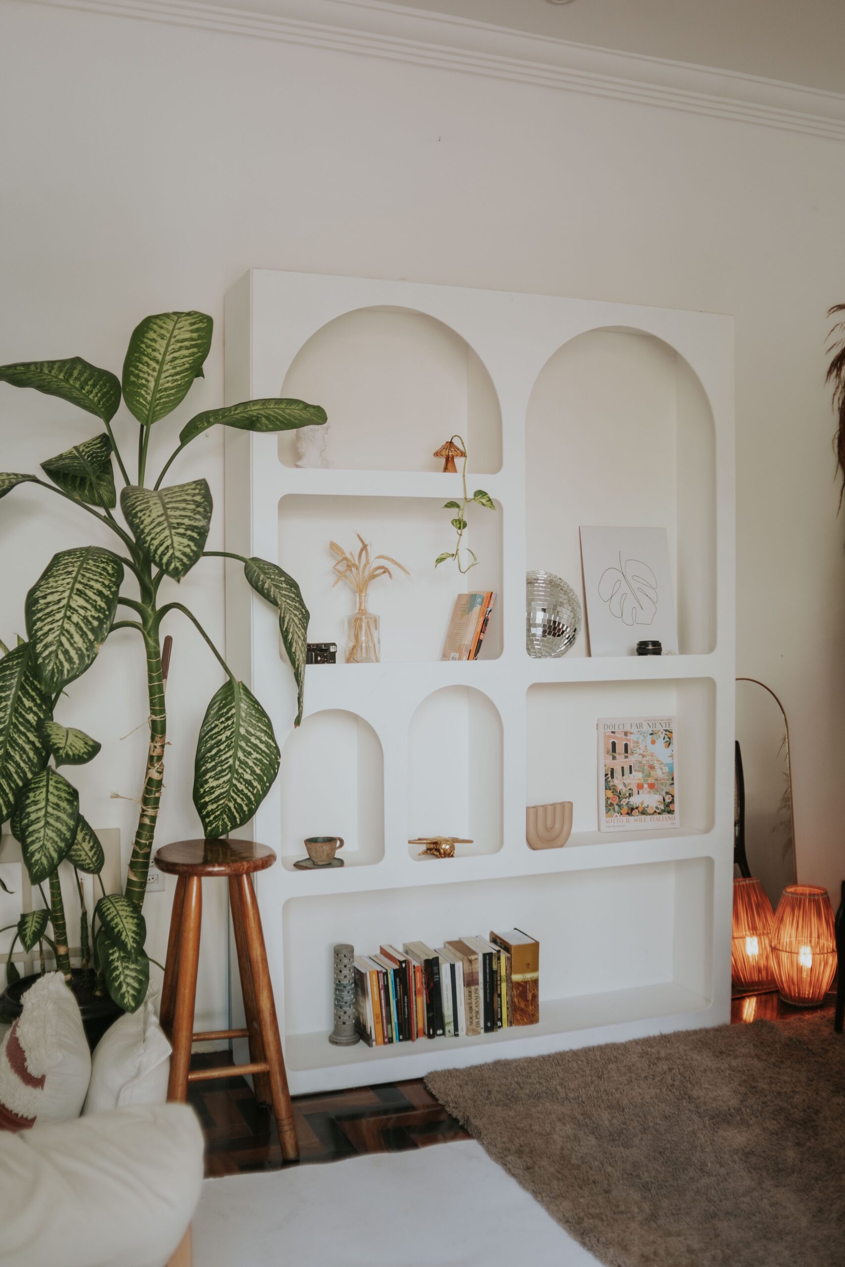 Living room with tall bookshelf — atmosphere, not a product pick